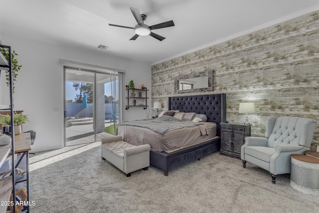 bedroom with light carpet, access to exterior, crown molding, and ceiling fan