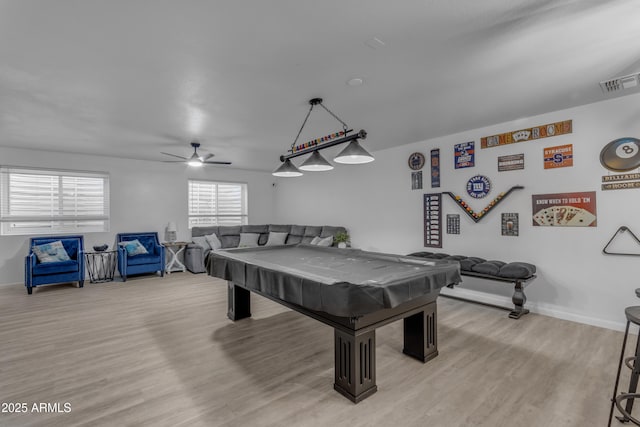 game room with ceiling fan, pool table, and hardwood / wood-style floors