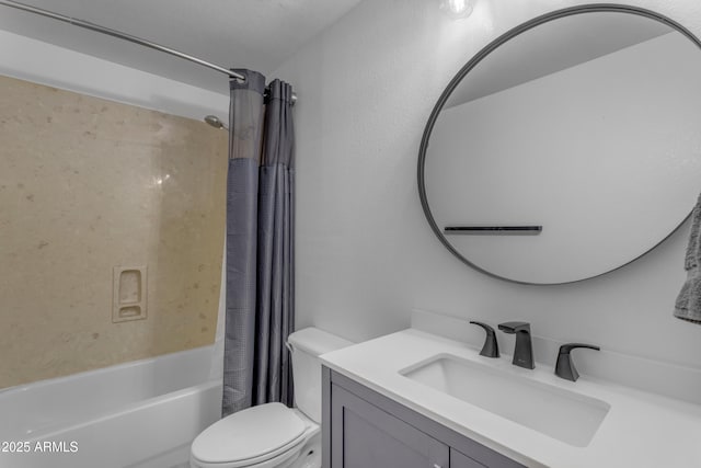 full bathroom with vanity, shower / bath combination with curtain, and toilet