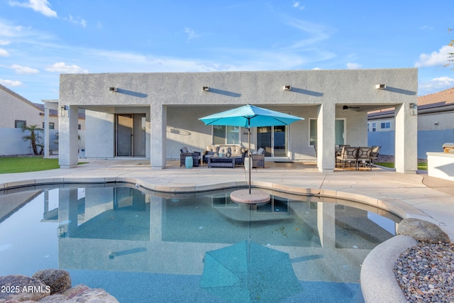 view of pool featuring an outdoor living space and a patio