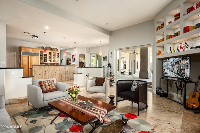 living room featuring built in shelves