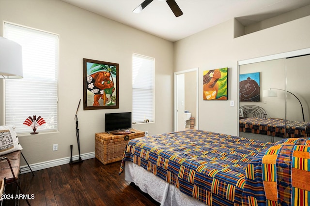 bedroom with ceiling fan and dark hardwood / wood-style floors