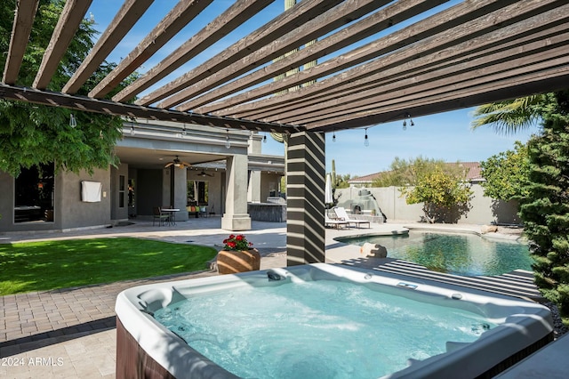 view of pool featuring a pergola, a hot tub, ceiling fan, and a patio area