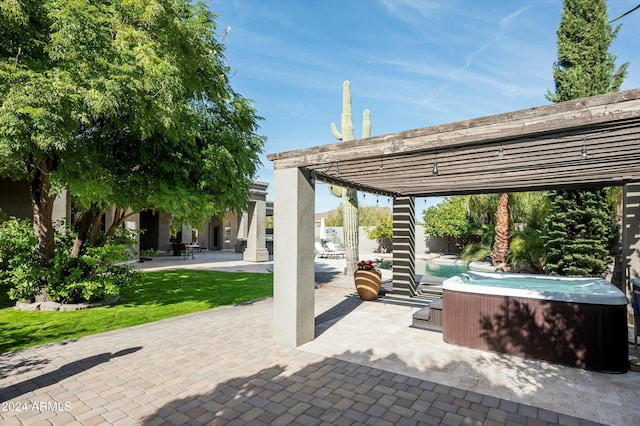 view of patio featuring a pergola and a hot tub