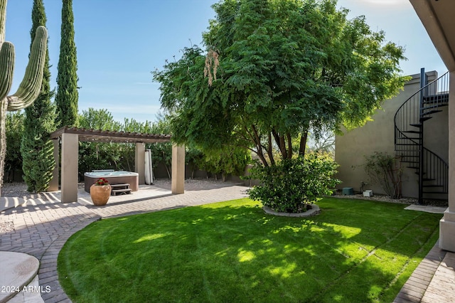 view of yard with a pergola and a patio