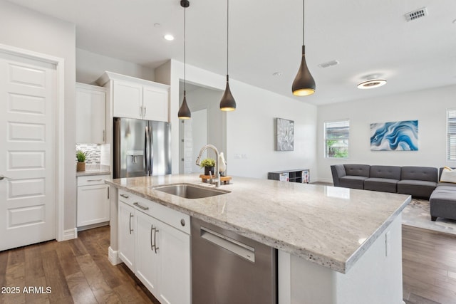 11872 W Duane Ln, Peoria, AZ 85383 - kitchen with appliances with stainless steel finishes, a sink, open floor plan, dark wood-style floors, and recessed lighting