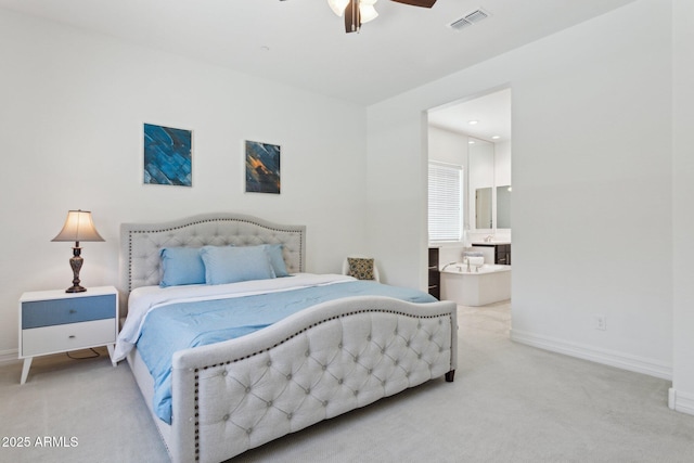 11872 W Duane Ln, Peoria, AZ 85383 - carpeted bedroom with baseboards, connected bathroom, and ceiling fan