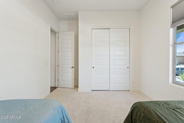 11872 W Duane Ln, Peoria, AZ 85383 - bedroom featuring carpet, a closet, and baseboards