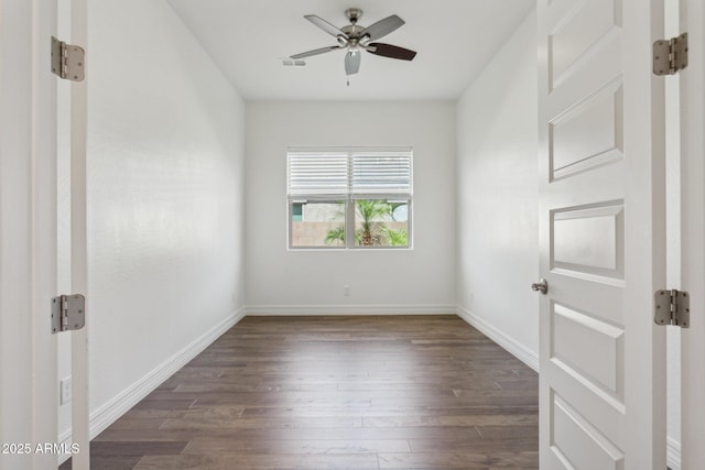 11872 W Duane Ln, Peoria, AZ 85383 - spare room featuring dark wood-style flooring, ceiling fan, and baseboards