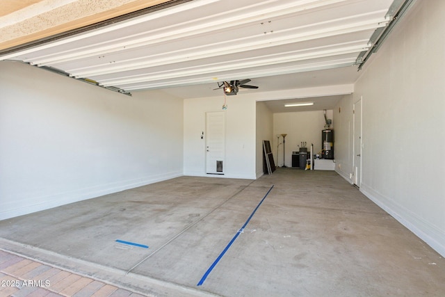 11872 W Duane Ln, Peoria, AZ 85383 - garage with a garage door opener, gas water heater, and baseboards