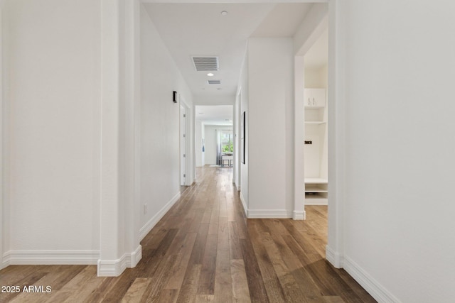 11872 W Duane Ln, Peoria, AZ 85383 - hallway featuring wood finished floors and baseboards