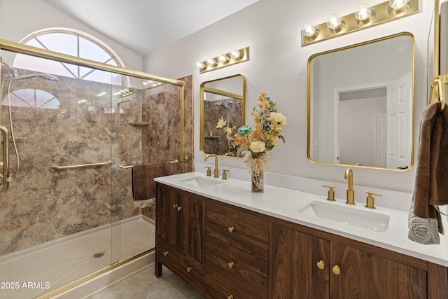 full bathroom featuring a sink, tile patterned flooring, and a stall shower