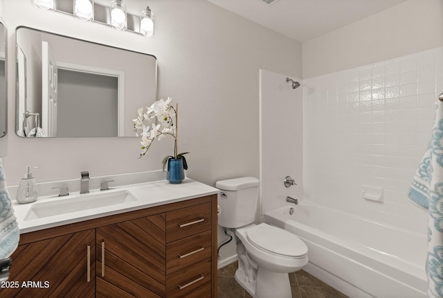 full bath with vanity, tile patterned flooring, shower / bath combination, and toilet
