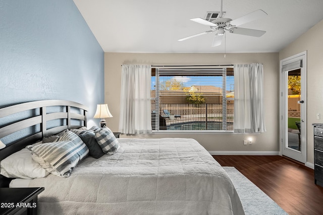 bedroom with visible vents, baseboards, ceiling fan, wood finished floors, and access to outside