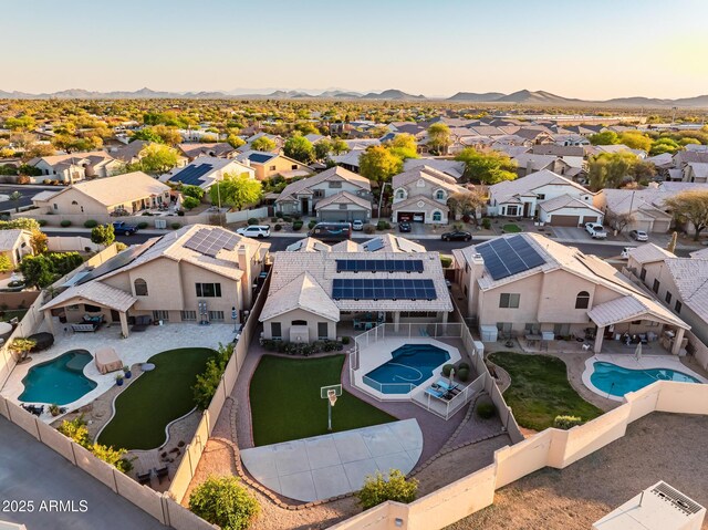 aerial view with a mountain view and a residential view