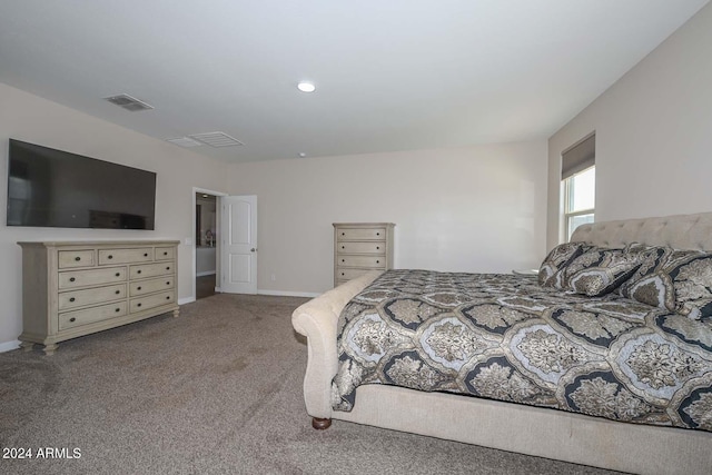 bedroom featuring visible vents, baseboards, and carpet flooring