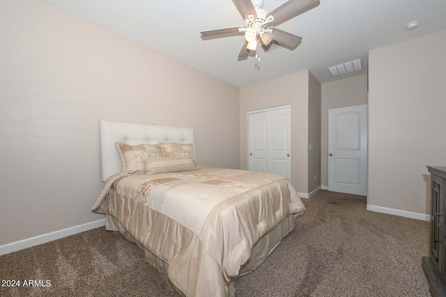 bedroom featuring visible vents, carpet floors, baseboards, and a ceiling fan