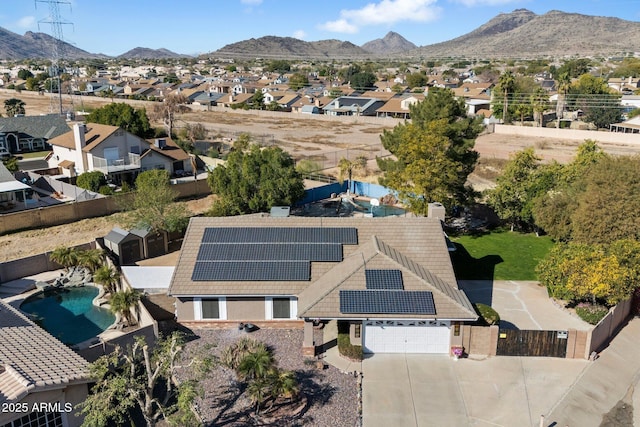 birds eye view of property featuring a mountain view