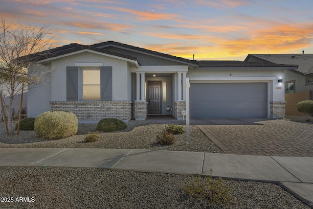 view of front of property featuring a garage