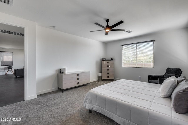 bedroom with ceiling fan and carpet floors