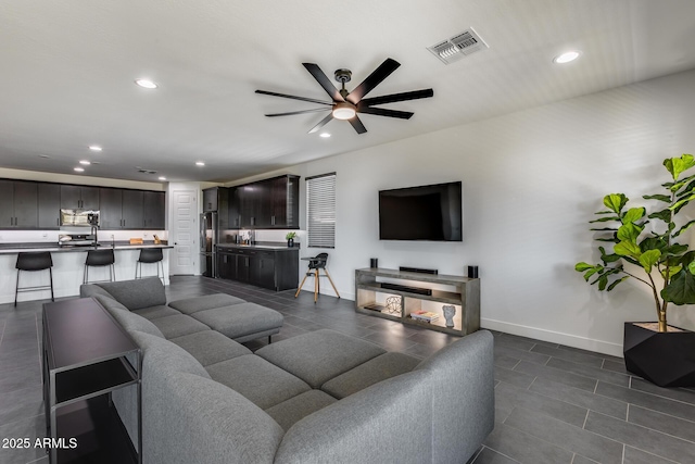 living room featuring ceiling fan