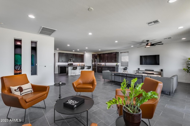 living room featuring ceiling fan