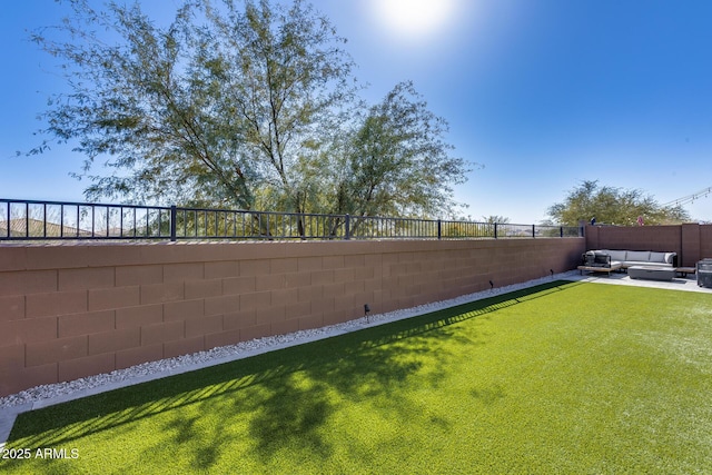 view of yard featuring an outdoor hangout area and a patio area