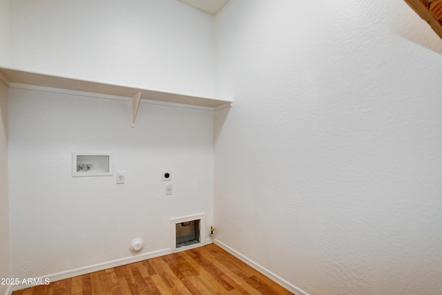 laundry room with laundry area, baseboards, hookup for a washing machine, gas dryer hookup, and electric dryer hookup