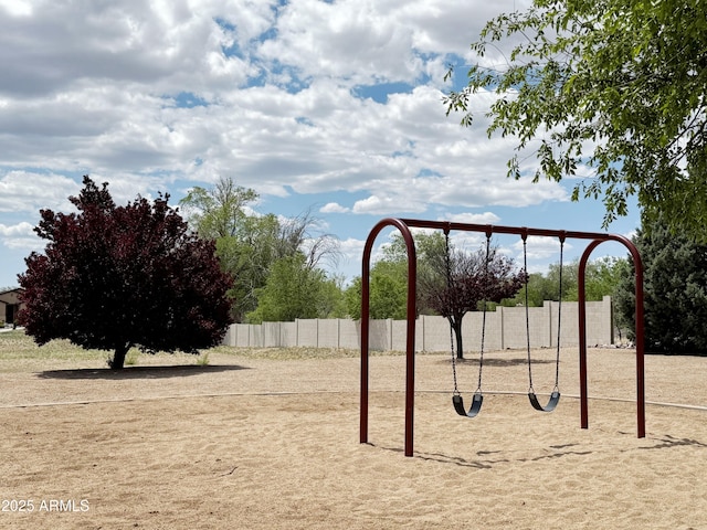 view of play area featuring fence