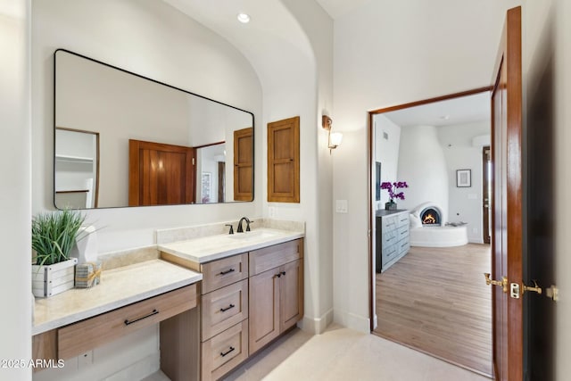 11334 E Troon Vista Dr, Scottsdale, AZ 85255 - bathroom featuring recessed lighting, baseboards, vanity, and wood finished floors