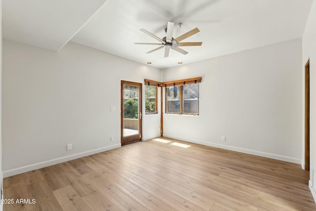 11334 E Troon Vista Dr, Scottsdale, AZ 85255 - unfurnished room with light wood-type flooring, a ceiling fan, and baseboards