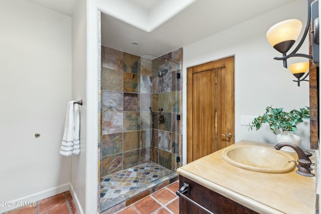11334 E Troon Vista Dr, Scottsdale, AZ 85255 - bathroom with a tile shower, vanity, tile patterned flooring, and baseboards