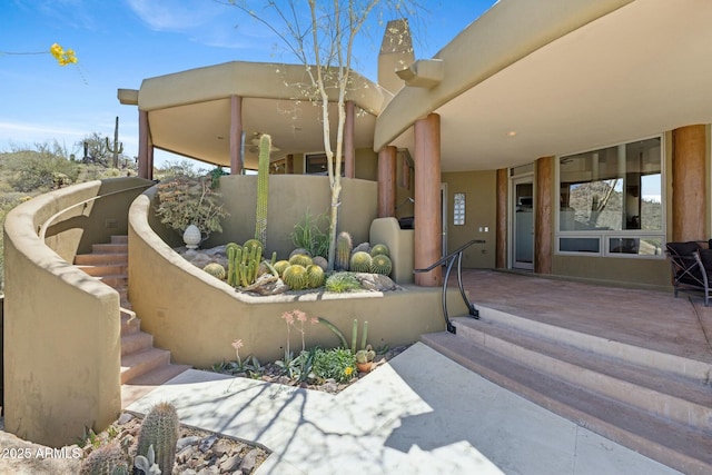 11334 E Troon Vista Dr, Scottsdale, AZ 85255 - exterior space featuring a chimney and stucco siding
