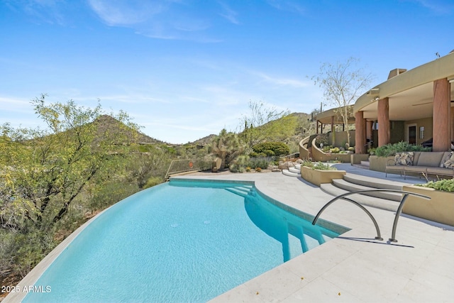11334 E Troon Vista Dr, Scottsdale, AZ 85255 - pool featuring a mountain view and a patio area