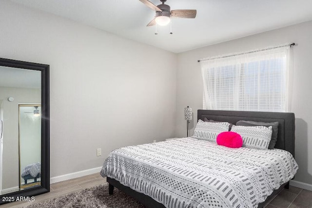 15610 N 29th St Unit 3, Phoenix, AZ 85032 - bedroom with wood finished floors and ceiling fan