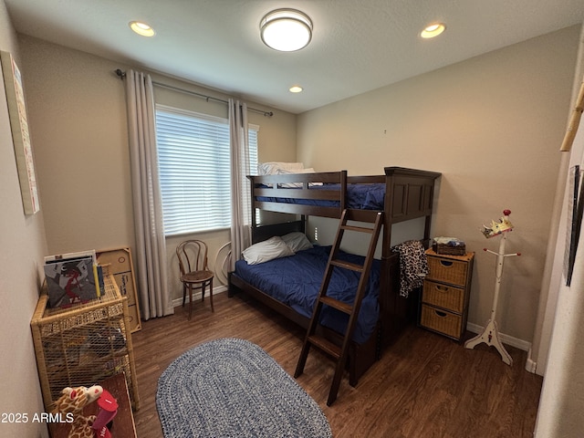 bedroom featuring dark wood-type flooring