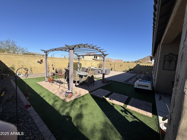 view of yard with a pergola and a patio area