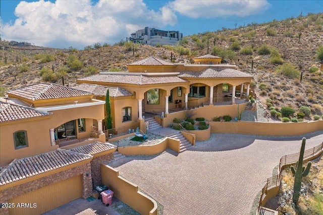 view of front of house featuring stucco siding