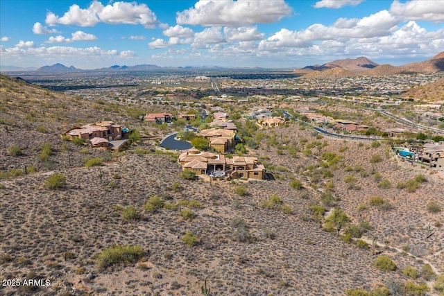 drone / aerial view featuring a mountain view