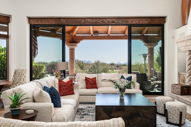 view of patio / terrace with a mountain view and an outdoor living space