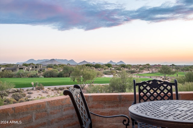 view of patio terrace at dusk