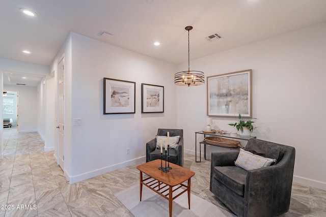 13719 W Amberwing St, Peoria, AZ 85383 - living area featuring baseboards, recessed lighting, a chandelier, and light marble finish flooring