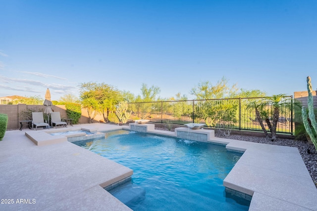 13719 W Amberwing St, Peoria, AZ 85383 - view of pool with a fenced backyard, a patio, and a pool with connected hot tub