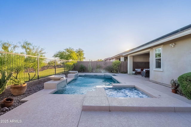 13719 W Amberwing St, Peoria, AZ 85383 - view of swimming pool featuring an in-ground hot tub, a fenced backyard, and a patio area