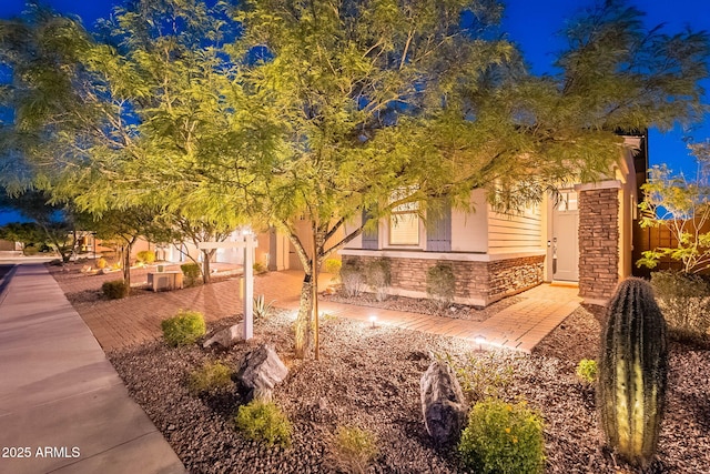 13719 W Amberwing St, Peoria, AZ 85383 - view of front of home featuring stone siding