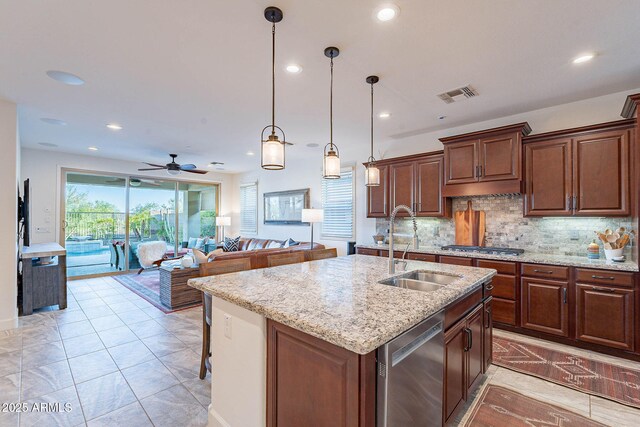 13719 W Amberwing St, Peoria, AZ 85383 - kitchen with stainless steel appliances, a sink, recessed lighting, backsplash, and ceiling fan