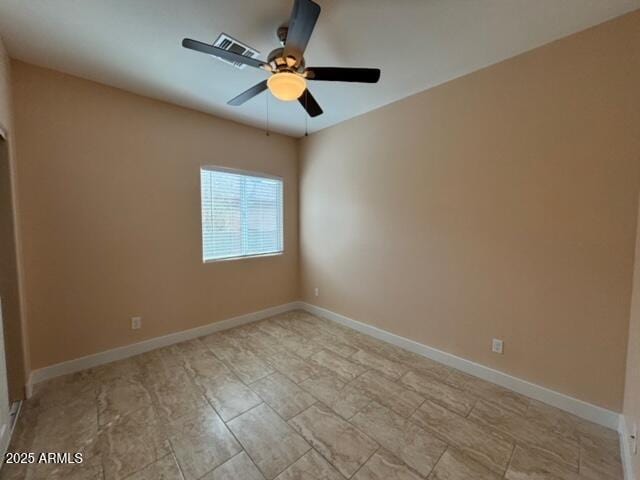 spare room featuring ceiling fan