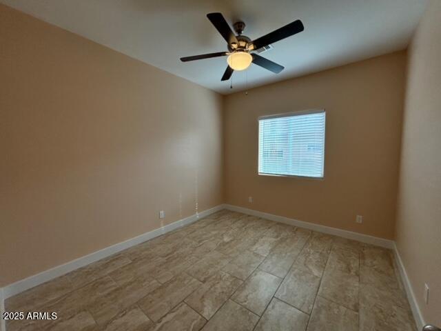 empty room with ceiling fan