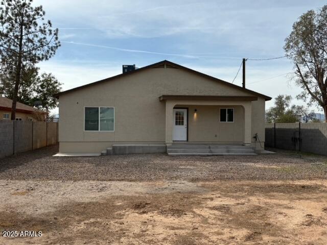 view of front of house with a patio