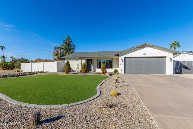 ranch-style home featuring a garage and a front yard